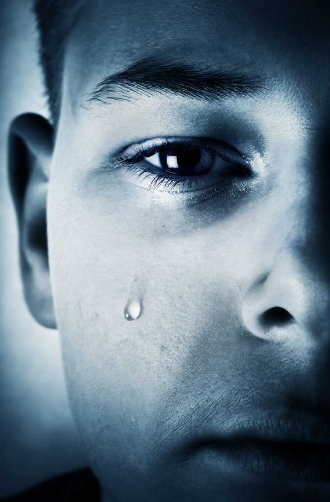 Boy with tear