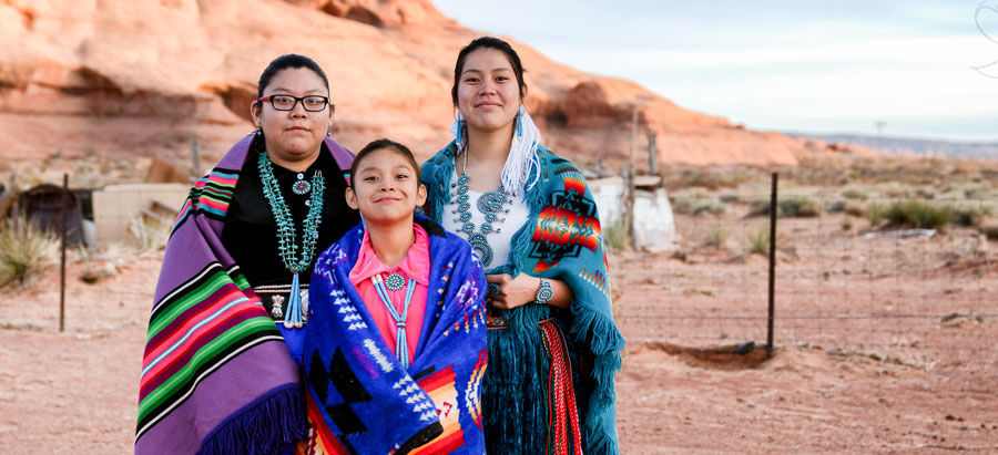 Native American Family in traditional colorful clothing