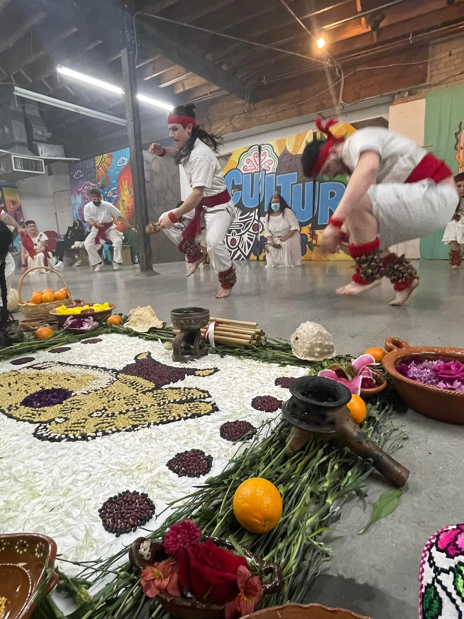 Samuel Torres and Leo Mejia of Kalpulli Yaocenoxtli offer danza in circle in the Matlaktli Tochtli ceremony. Kalpulli Yaocenoxtli is a traditional Mexica kinship community in St. Paul, Minnesota.